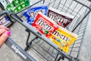 4 bags of m&ms candy share bags in a cart