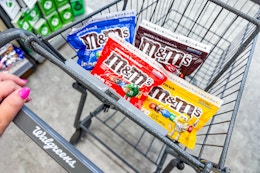 4 bags of m&ms candy share bags in a cart