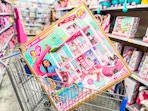 In-store photo of Barbie Pool Party Dreamhouse in Walmart shopping cart