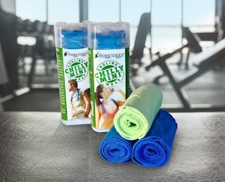green and blue towels on a counter in a gym