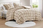 Lifestyle image of the Intelligent Design King Comforter Set in the color tan