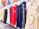 women's dresses sitting on a target rack
