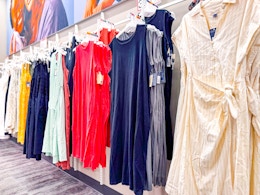 women's dresses sitting on a target rack