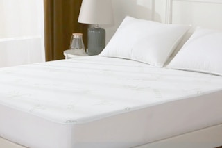 mattress protector on bed