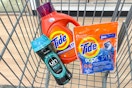 tide and downy laundry products in a cart