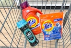 tide and downy laundry products in a cart
