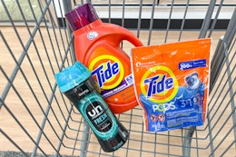 tide and downy laundry products in a cart