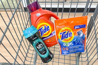tide and downy laundry products in a cart