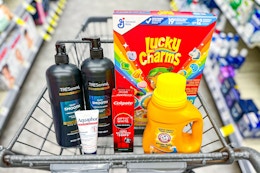 tresemme shampoo, aquaphor ointment, colgate toothpaste, lucky charms cereal, and arm and hammer detergent in a cart