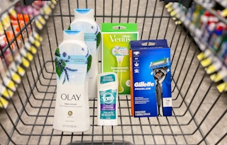 a walgreens cart with olay body wash, gillette and venus razors, and tom's deodorant