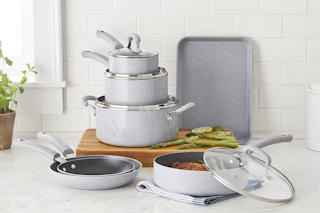 cooks 11 piece splatter non stick cookware set on a counter