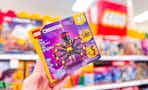 hand holding a lego spider set at target