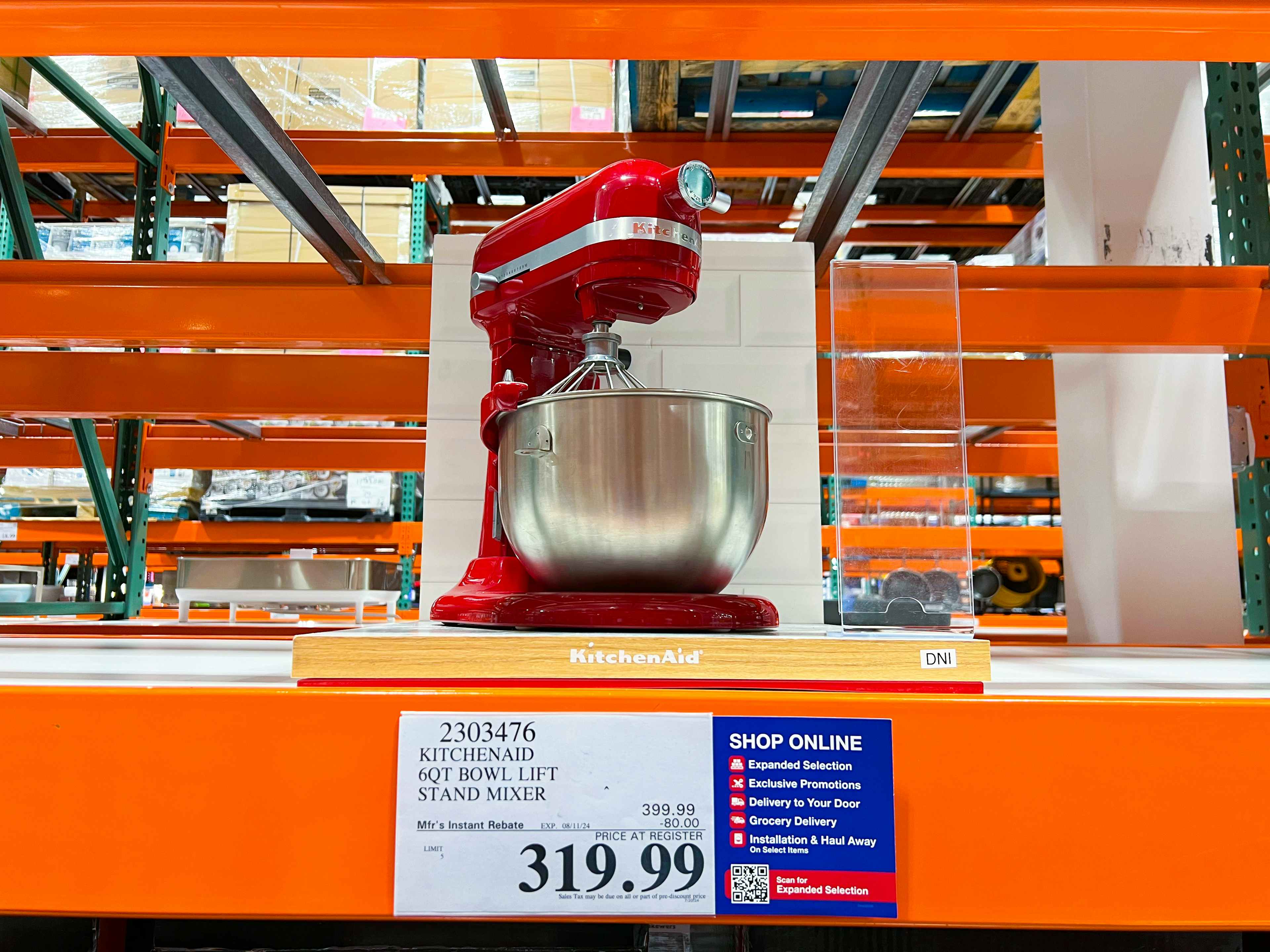 red kitchenaid stand mixer on display at costco