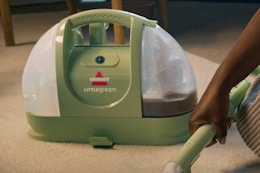 BISSELL Little Green Multi-Purpose Portable Carpet and Upholstery Cleaner being used on carpets.