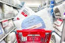 target bed pillows sitting in a cart in a bedding aisle