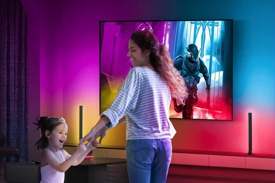 a woman and child by led bars