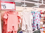 carter's baby rompers sitting on a target shelf