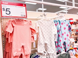 carter's baby rompers sitting on a target shelf