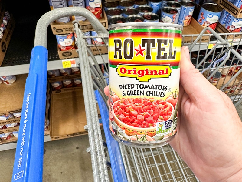 a can of rotel tomatoes being held in store