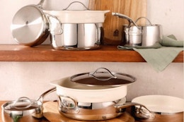 Bloomhouse 12 Piece Triply Stainless Steel Pots and Pans Cookware Set on kitchen shelving.