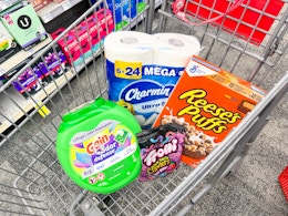 CVS shopping cart with gain, charmin, trolli, reese's puffs