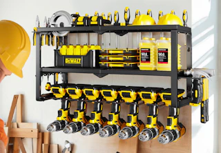 a power tool organizer on a wall with tools 