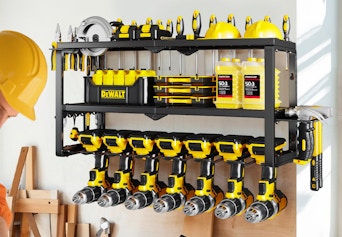 a power tool organizer on a wall with tools 