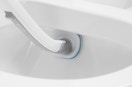 a toilet brush cleaning a toilet