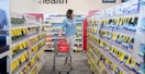 a person shopping with a cart at CVS