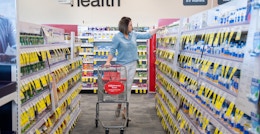 a person shopping with a cart at CVS
