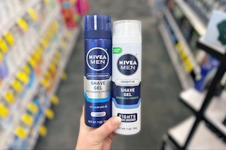 hand holding two cans of nivea men shave gel
