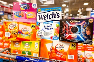 cart full of snacks including goldfish, oreo cookies, welchs fruit snacks