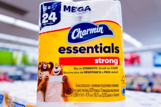 pack of toilet paper on top of other toilet paper packs on store shelf