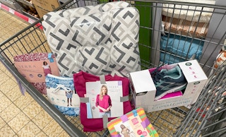 several apparel and a seat cushion in a cart at aldi