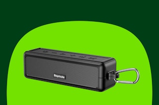 A rectangular waterproof bluetooth stereo speaker has a carabiner on one end for hanging, a removable frame, and a length of 9.5 inches