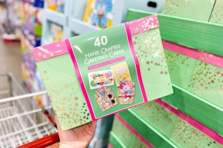 hand holding an all occasion greeting card collection