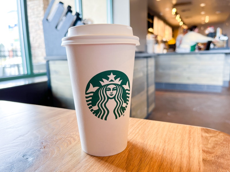 Starbucks hot cup inside a store