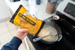 a woman cooking la moderna pasta