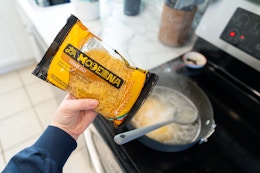 a woman cooking la moderna pasta