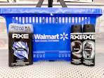 3 axe sprays sitting in front a walmart shopping basket
