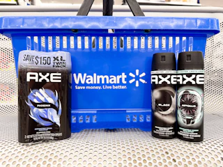 3 axe sprays sitting in front a walmart shopping basket