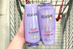 hand holding L'Oreal Elvive products