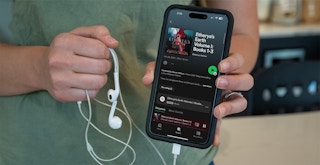 someone opening up a romance audiobook on their Spotify app