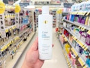 hand holding dove shampoo in walgreens