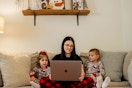 Mom and children sitting on a couch