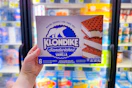 hand holding a box of klondike bars