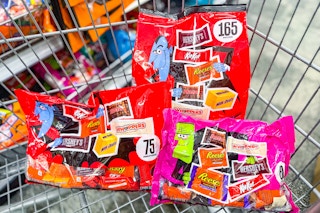 large bags of halloween candy in a cart
