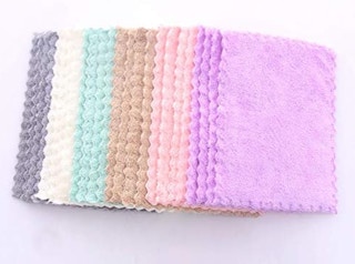 a stack of colorful dishcloths 