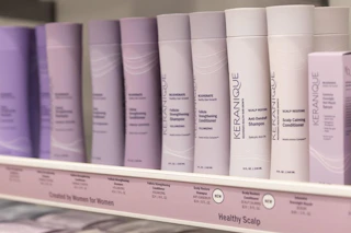 keranique shampoo and conditioner on a shelf