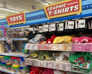 Dollar Tree Plus displays of $3 and $5 t-shirts and toys